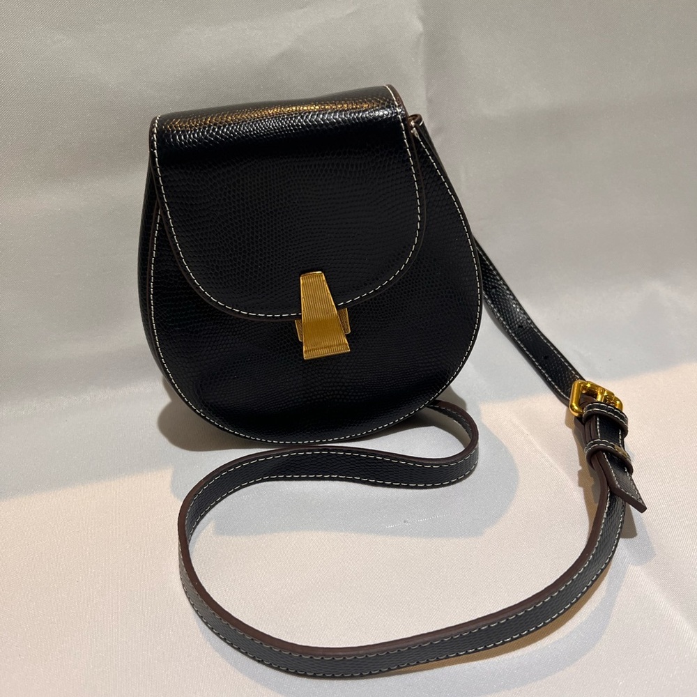 Small navy bucket belt purse with adjustable strap Gold clasp closure